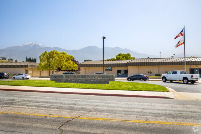 Waiving flags and blue skies at Ridgeview Elementary School in the Upper Yucaipa-Rolling Hills neighborhood.