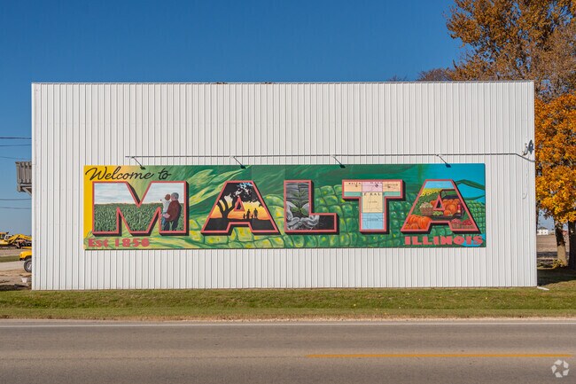 A colorful mural welcomes visitors and residents to Malta.