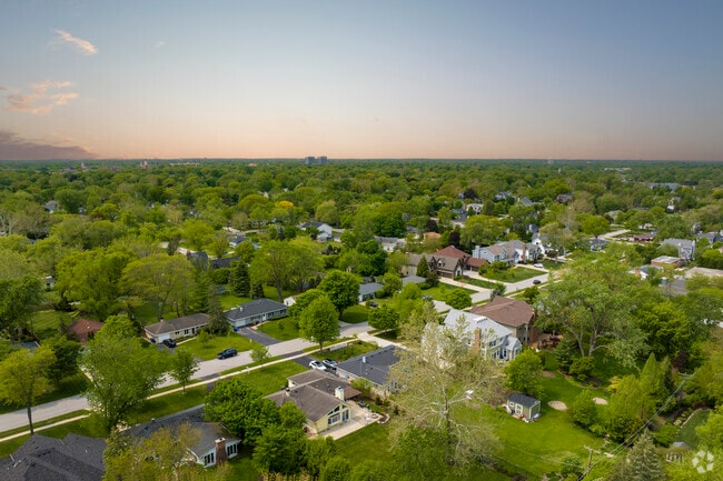 Charming and lush tree lined streets keep the Hawthorne community close by and neighuborly.