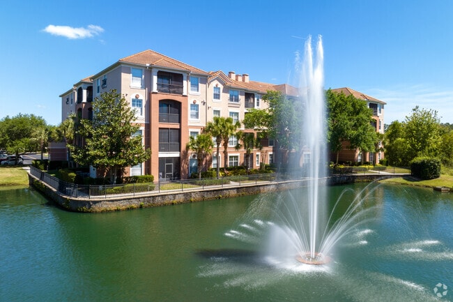 Each apartment unit in Championsgate features its own balcony with scenic waterfront views.