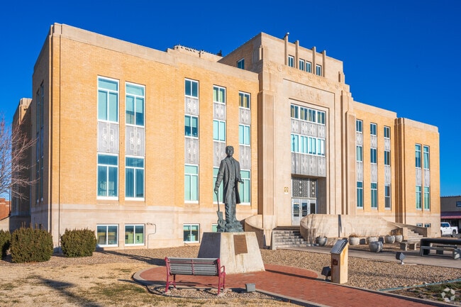 Roosevelt County Courthouse, an Art Deco building built in 1938, sits on the town square.