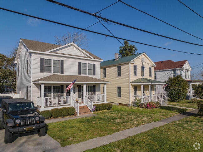 Many of the ornamental trims and corbels are characteristic of those architectural styles.