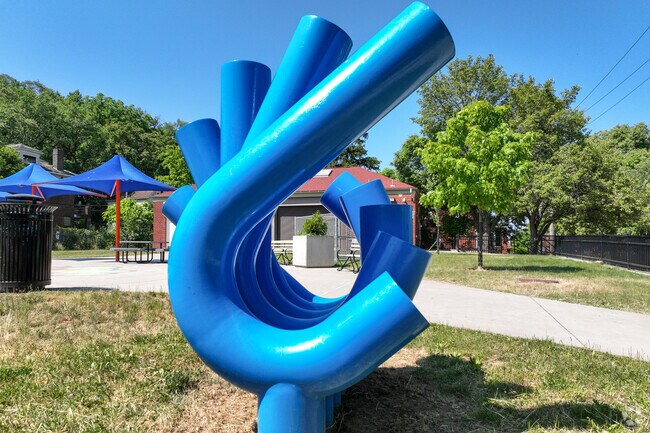 An art sculpture in Lincoln-Lemington-Belmar stands out amongst the street.