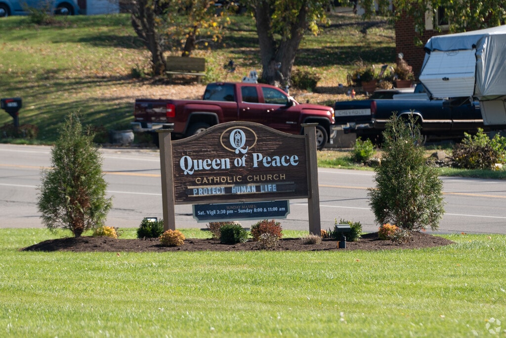 The Queen of Peace signage.