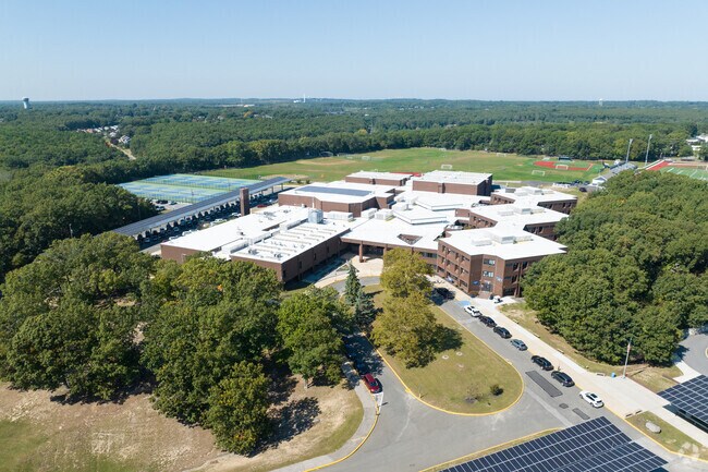 Smithtown West High School shares grounds with Acompsett Middle & Elementary Schools.