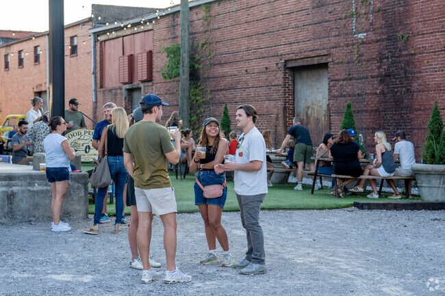 Enjoy time with friends at Good People Brewing Company near West End Manor.