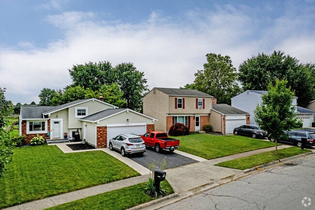 Well-manicured lawns are commonplace in the Sweetwater neighborhood.