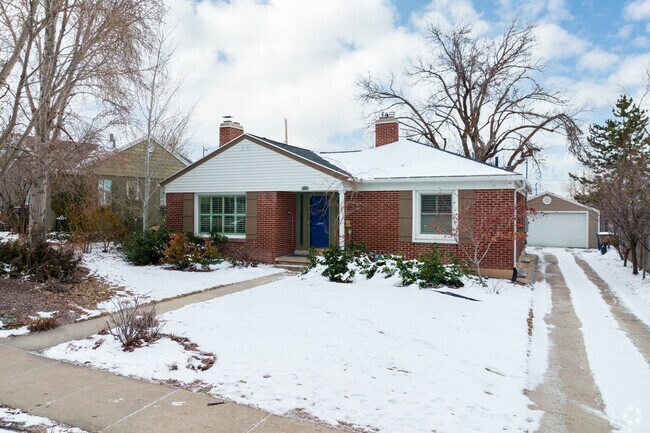 Red brick exterior of this single story ranch style home in Bonneville Hills.