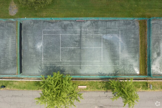 Park Street Tennis Courts offer a scenic spot for outdoor play in Haworth.