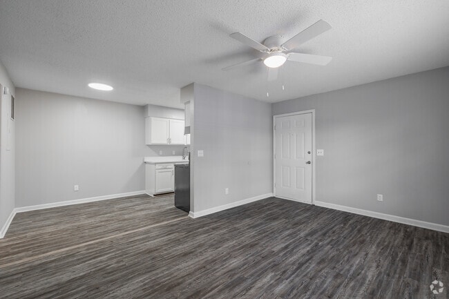 1BR, 1BA - 650SF - Living Room and Dining Room