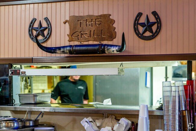 The chef works quickly in the busy diner in Burnside Township.