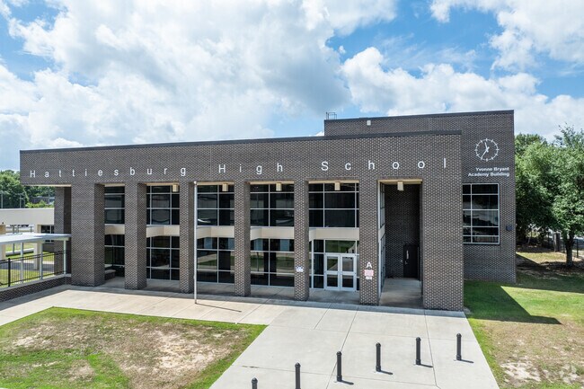 Hattiesburg High School is enrolls 964 students yearly.