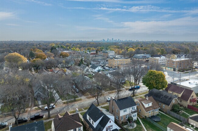 An aerial view reveals Sunset Heights' tree-lined streets.