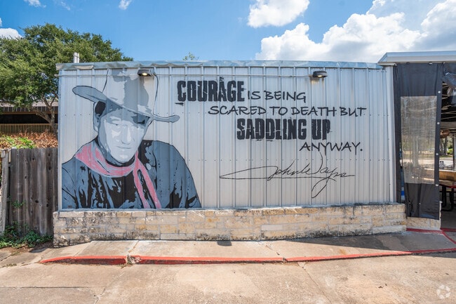Dozens of hand painted murals line the streets of nearby Clute, a short drive from Oyster Creek.
