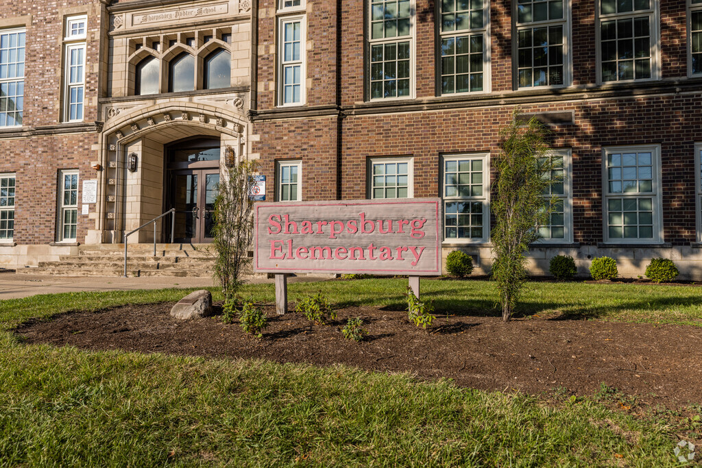 View of school sign and entrance to Sharpsburg Elementary School in the Norwood neighborhood.
