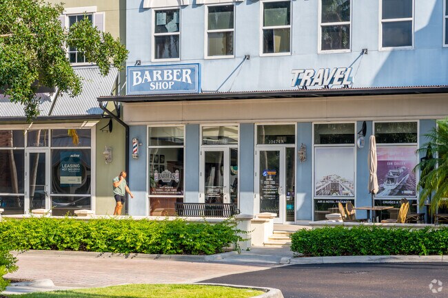 You can find many local shops like a barber and travel agency in Tradition Village Center.