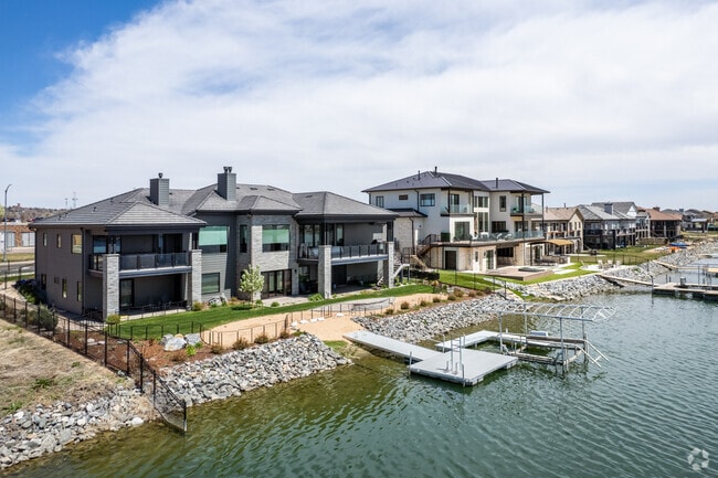 There are large lakeside homes on Hidden Lake in East Westminster, CO.