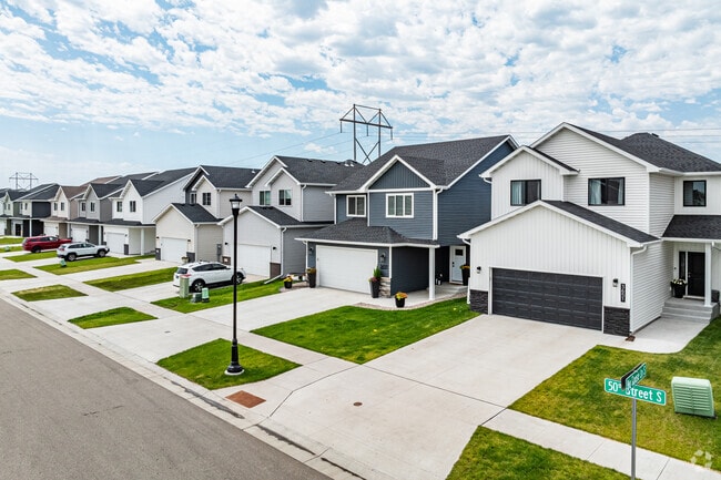 Discover orderly rows of homes in Brandt Crossing, blending suburban charm with modern design.