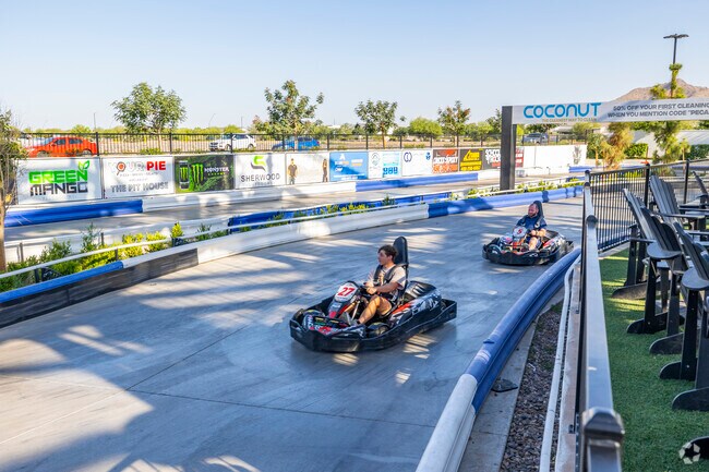 Residents of The Villages at Queen Creek can get their adrenaline fix behind the wheel of electric go-karts at Pecan Lake Entertainment.