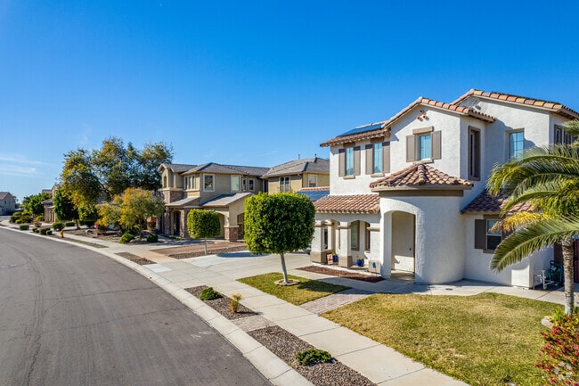 Single-family homes sit behind wide sidewalks in Canyon Trails.