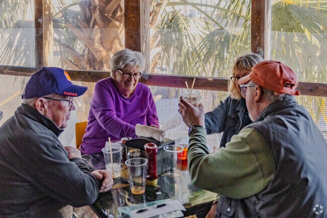 Enjoy patio dining with family and friends at McConkey's Jungle Shack on Edisto Island.