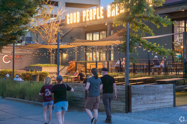 Grab a burger with friends at Good People Brewing Company near Smithfield Estates.
