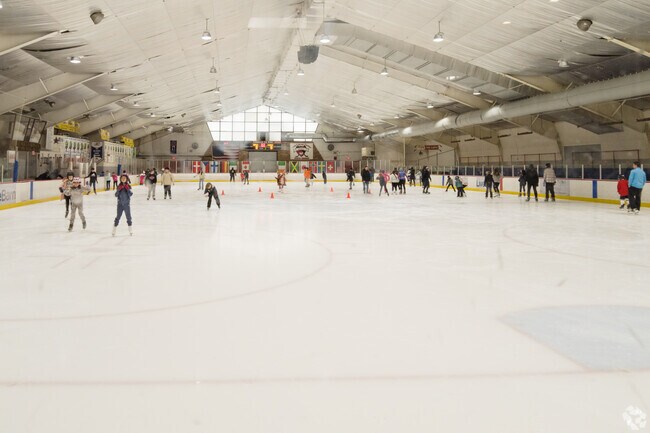 Families often skate at The Rinx in Hauppauge during winter evenings.