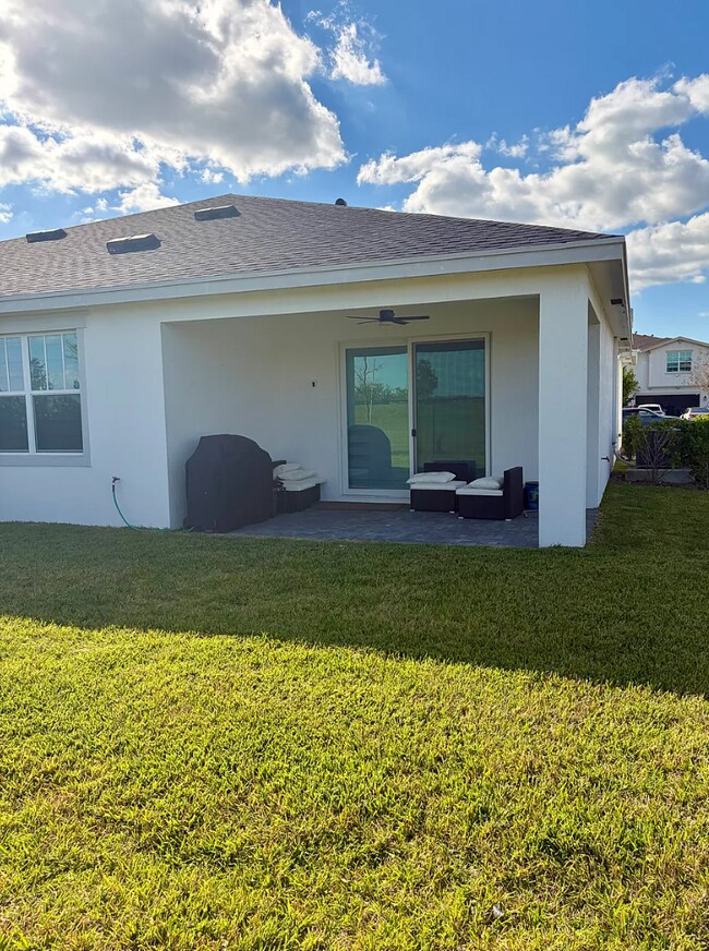 1446 Tangled Orchard Trace, Loxahatchee, FL 33470 - photo 4