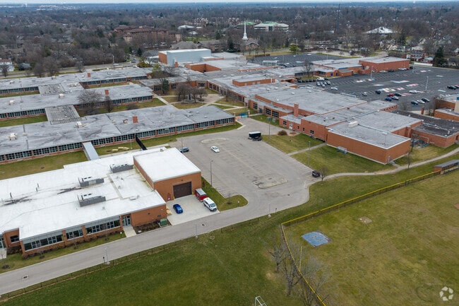Teachers greet students with smiles at Kettering Fairmont High School.