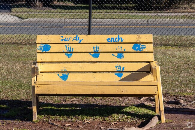 A Buddy Bench sits on the playground  at Knollwood Elementary School in Piscataway.