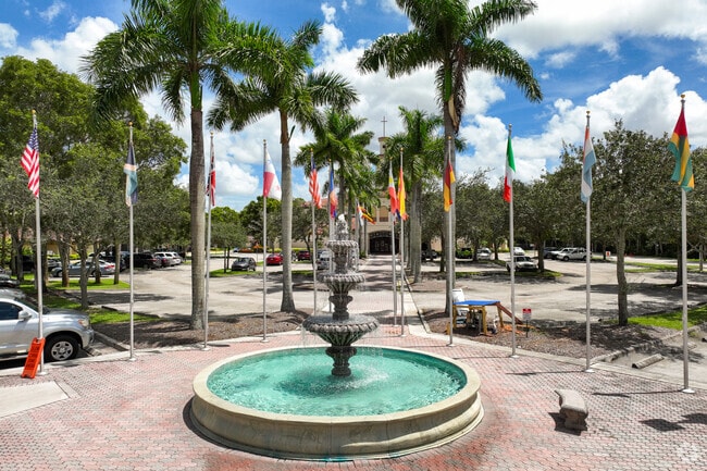 International flags and a fountain that welcomes you when you go to Beran School.