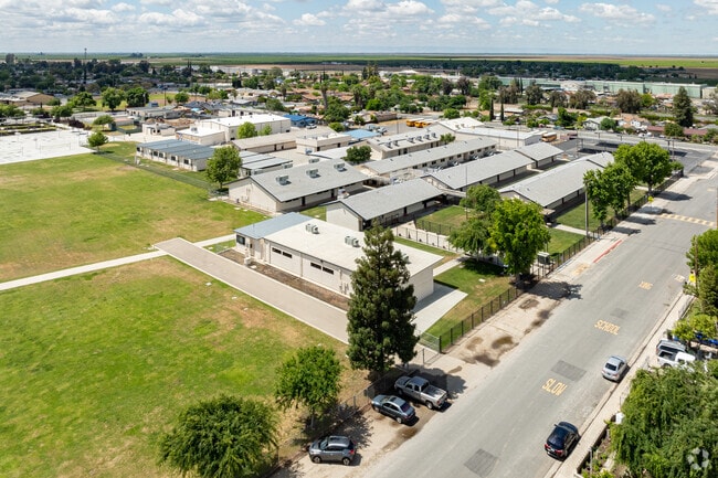 Earlimart Middle School provides large green areas and courts for student to play.