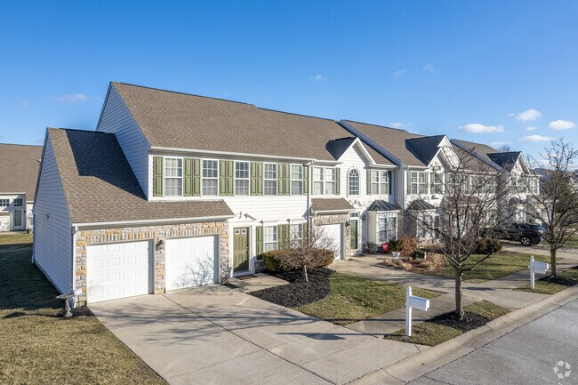 In Newtown large upscale houses built in the ‘90s and 2000s surround the Ivy Hills Country Club.