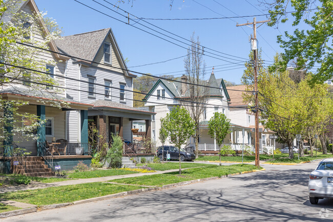 In the summertime at Aspinwall, neighbors open their windows for fresh air.