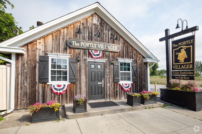 Enjoy a tasty sandwich and an ice cold beverage at The Portly Villager in Sayville.