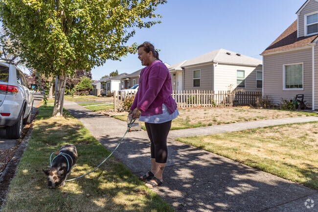 New West Side’s wide residential streets have sidewalks and mature trees.