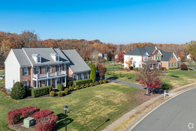 Large single-family homes with spacious lots line the streets of Highland Home.
