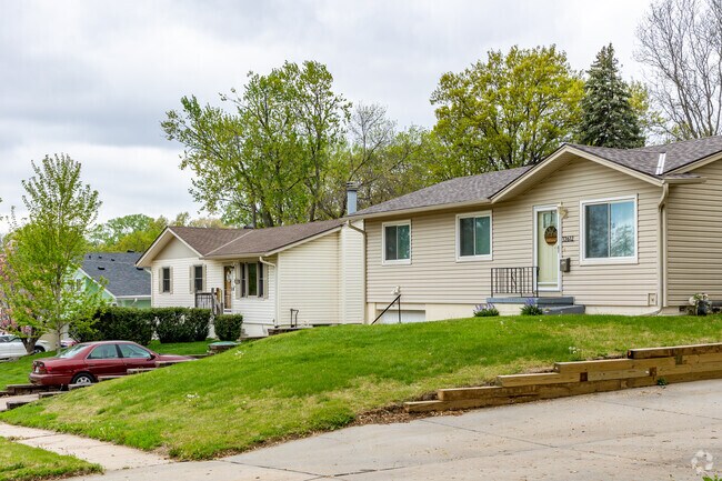 Most Old Millard East streets are bordered by paved sidewalks, convenient for dog-walking or daily strolls.