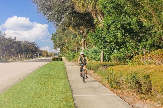 An Evergrene resident explores the neighborhood on her bike.