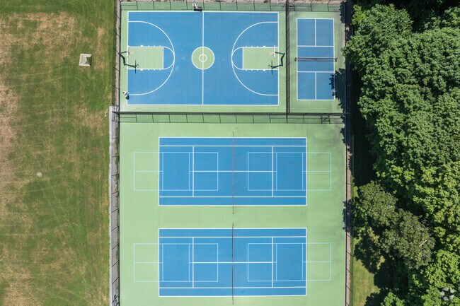 Play tennis, pickle-ball or basketball on the courts in front of the Lawrence School.