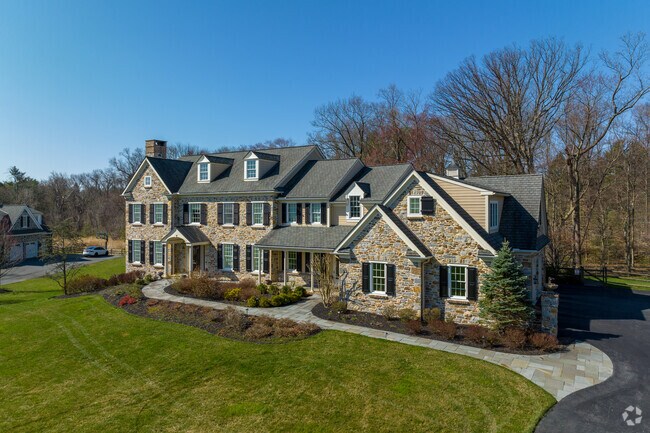 Homes in Greenville often have large yards and garages.