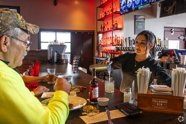 A lunch time Margarita is poured with expertise and love at Alpha's Stone House.