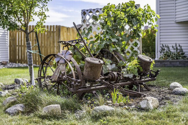 Some homes have creative yard decorations, like this farm equipment in Arbor Glen.