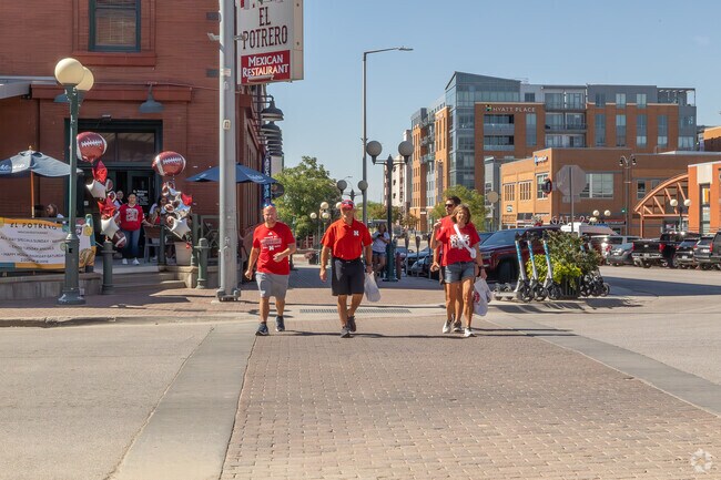 Cornhusker fans elevate the Lincoln downtown area with activity on game day.