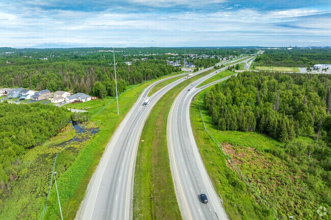 Nearby highways like Walter J. Hickel Parkway provide a quick route to downtown Anchorage.