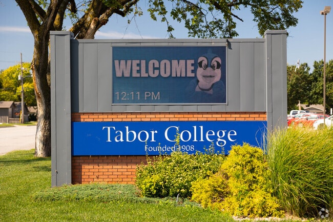 The Bluejay mascot appears on the Tabor College sign near campus in Hillsboro.
