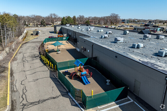 There is a playground behind Step-By-Step Montessori School.