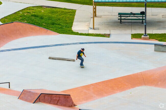 Skateboarders practice their skills at E.B. Rains Jr. Memorial Park in Northglenn.