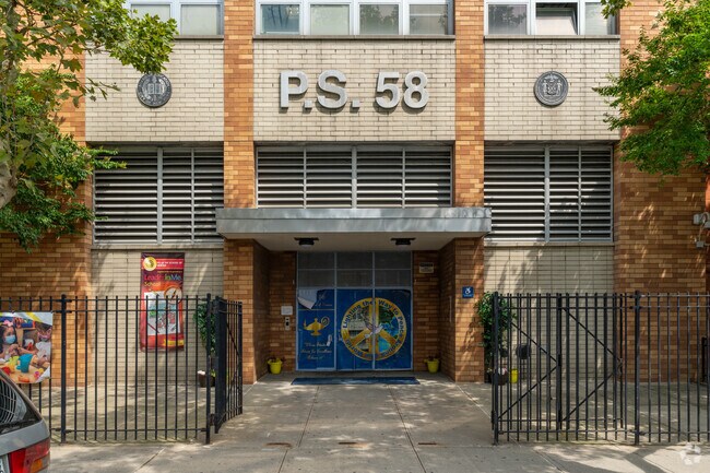 Main entrance to the PS 58 School Of Heroes is located along 57th Ave.