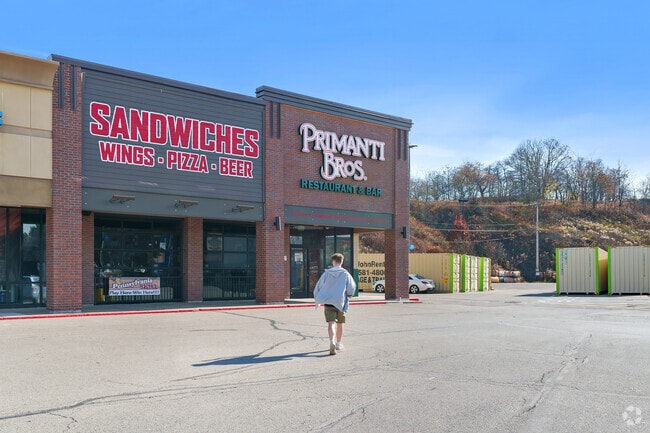 Locals gather at Primanti Brothers for iconic sandwiches and friendly service in Monaca.